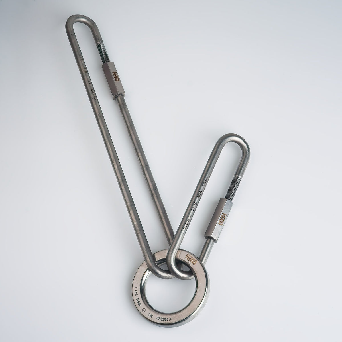 Titanium lower-off ring connected to titanium quick links as a single-metal anchor